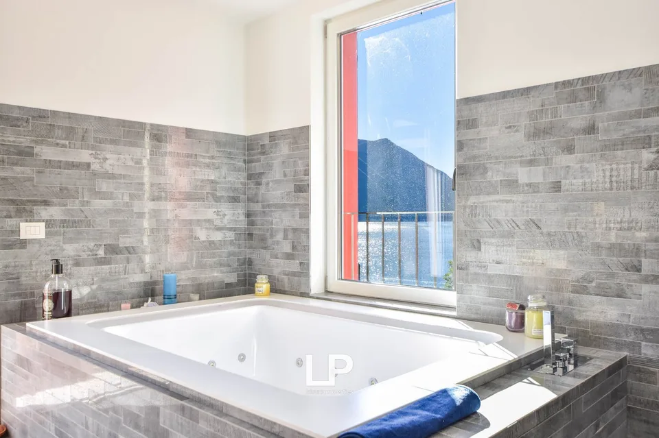 Appartement directement sur le lac de Lugano – photo 16 sur 30