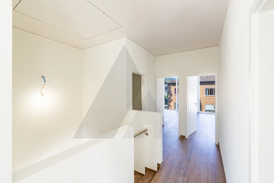 NUOVA CASA A SCHIERA: DESIGN INNOVATIVO E COMFORT SOSTENIBILE – Foto 9 von 13