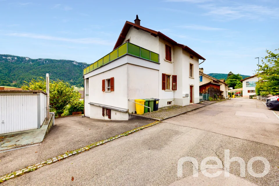 Immeuble de rendement | 13 garages | et Terrain constructible !