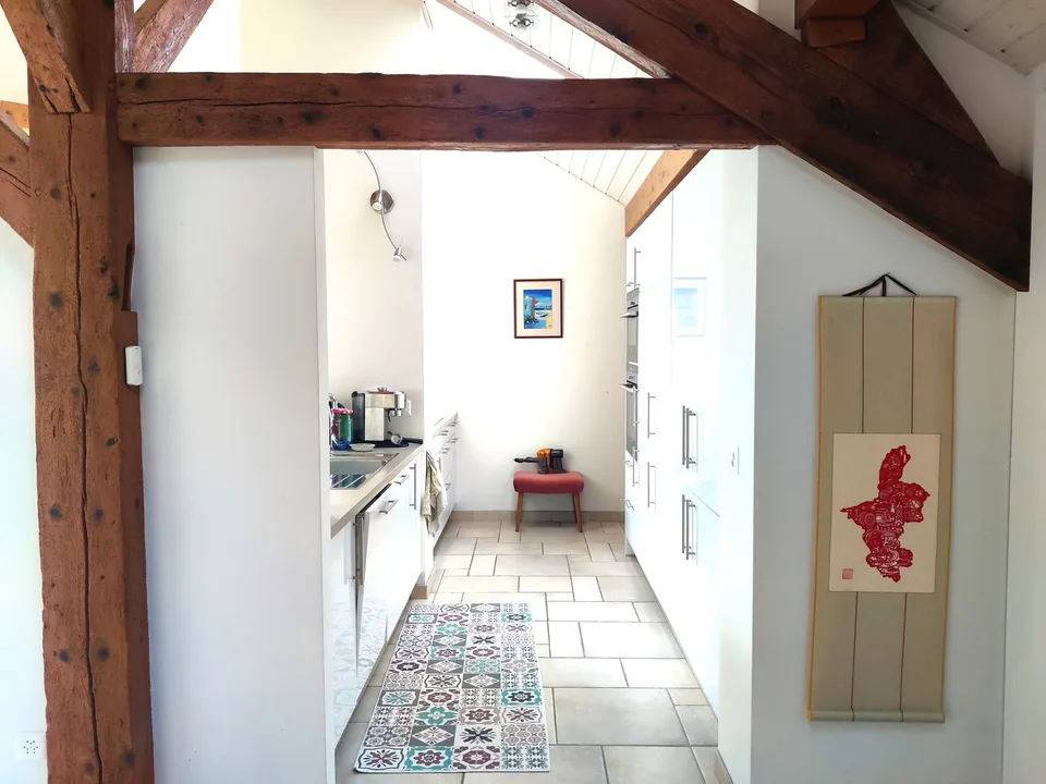 Delizioso appartamento di 6 locali all'ultimo piano di una fattoria ristrutturata