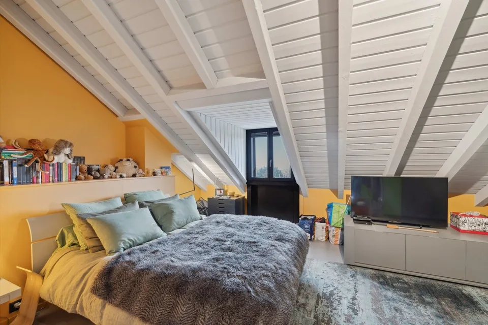 Élégant duplex aux volumes généreux, entouré de nature – photo 13 sur 13