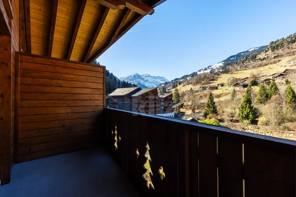 Bel appartement avec balcon et vue dégagée – photo 10 sur 13