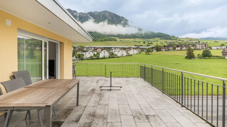 Modern multi-family house with three 3.5-room apartments in Buochs