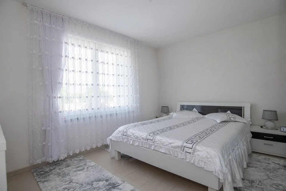 Casa di tre famiglie ristrutturata in una posizione tranquilla e centrale – foto 13 di 13