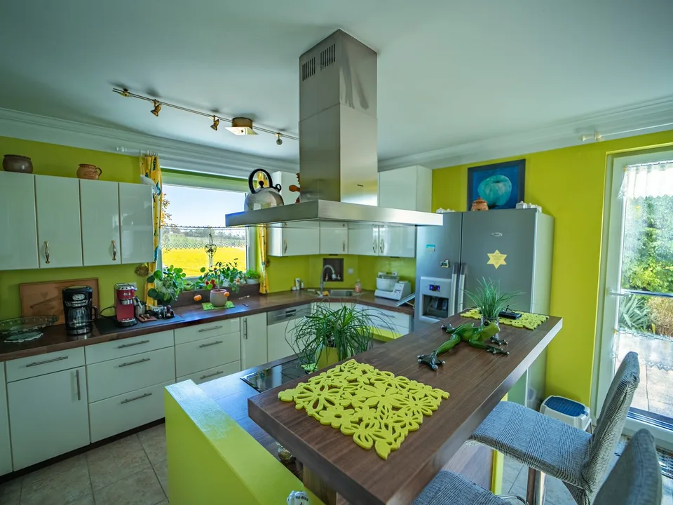 Casa unifamiliare attraente con vista sulle Alpi incluse un appartamento vacanze