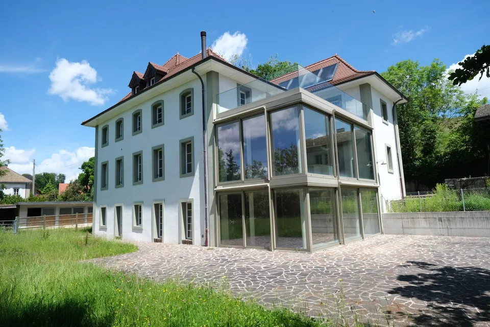 Maison de maître avec affectation mixte (habitation/bureaux) et une écurie