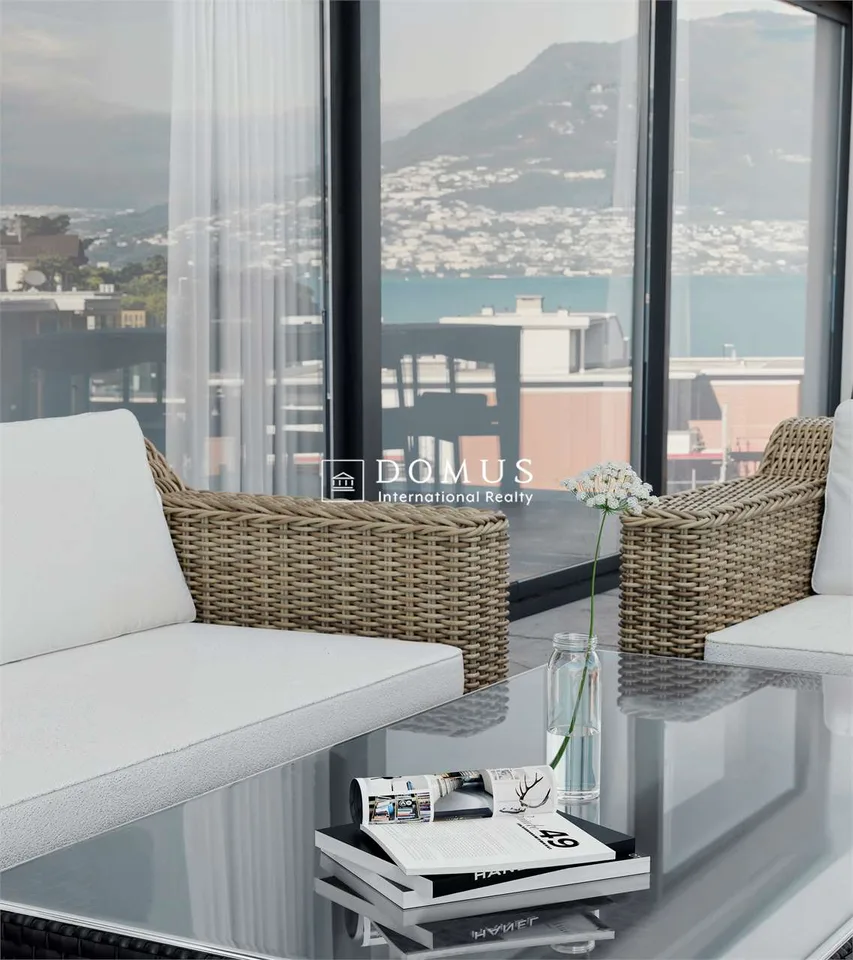 Attico 5,5 locali con vista lago