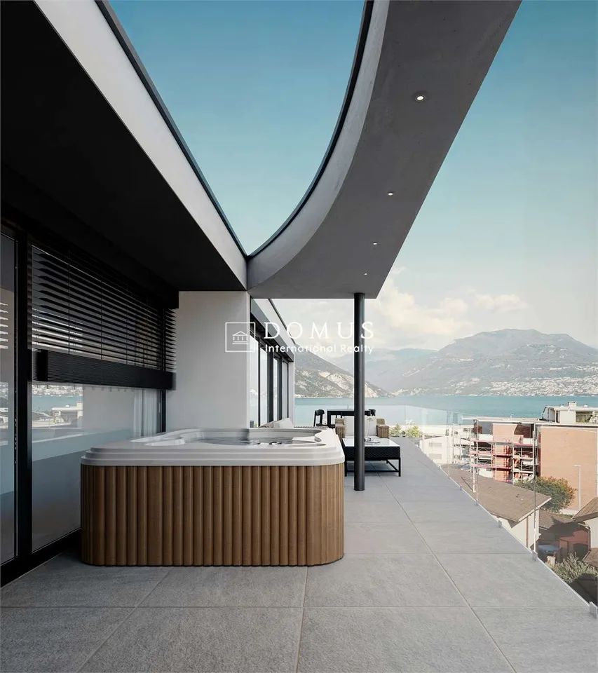 Attico 5,5 locali con vista lago