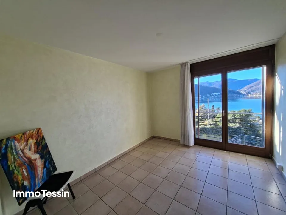 GELEGENHEIT: Wohlfühloase mit fantastischer Seesicht auf den Lago di Lugano an sehr ruhiger und sonniger Lage nahe Lugano – Foto 11 von 13