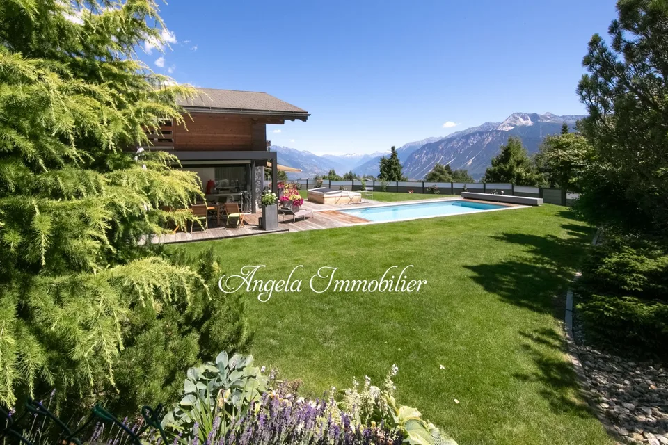 Stunning 7-Room Chalet with Pool in Crans-Montana
