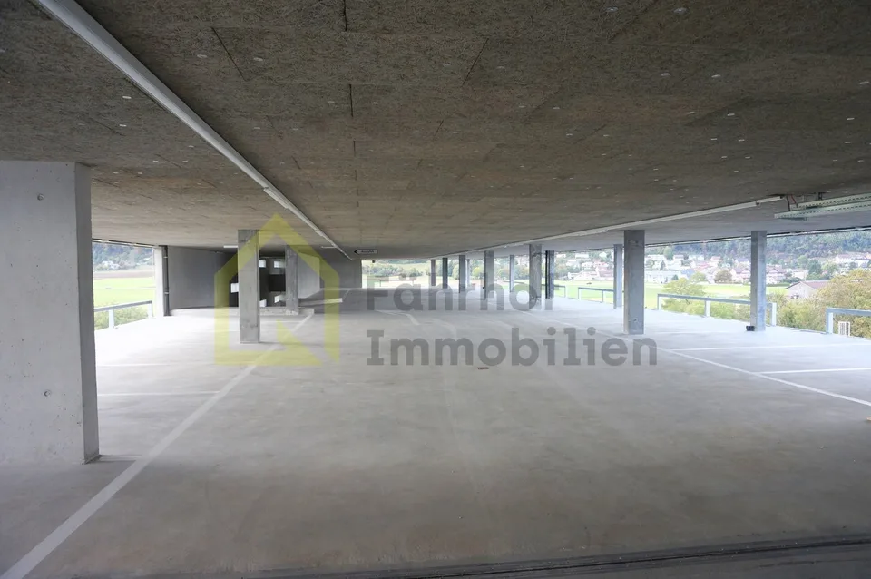 Parking spaces in parking garage (E-Mobility charging stations available)