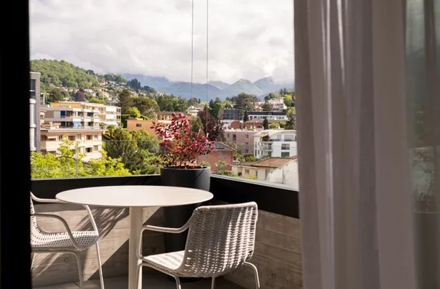 Appartement moderne 1.5 pièces à Massagno avec vue panoramique à 950 CHF/mois + forfait de services obligatoires