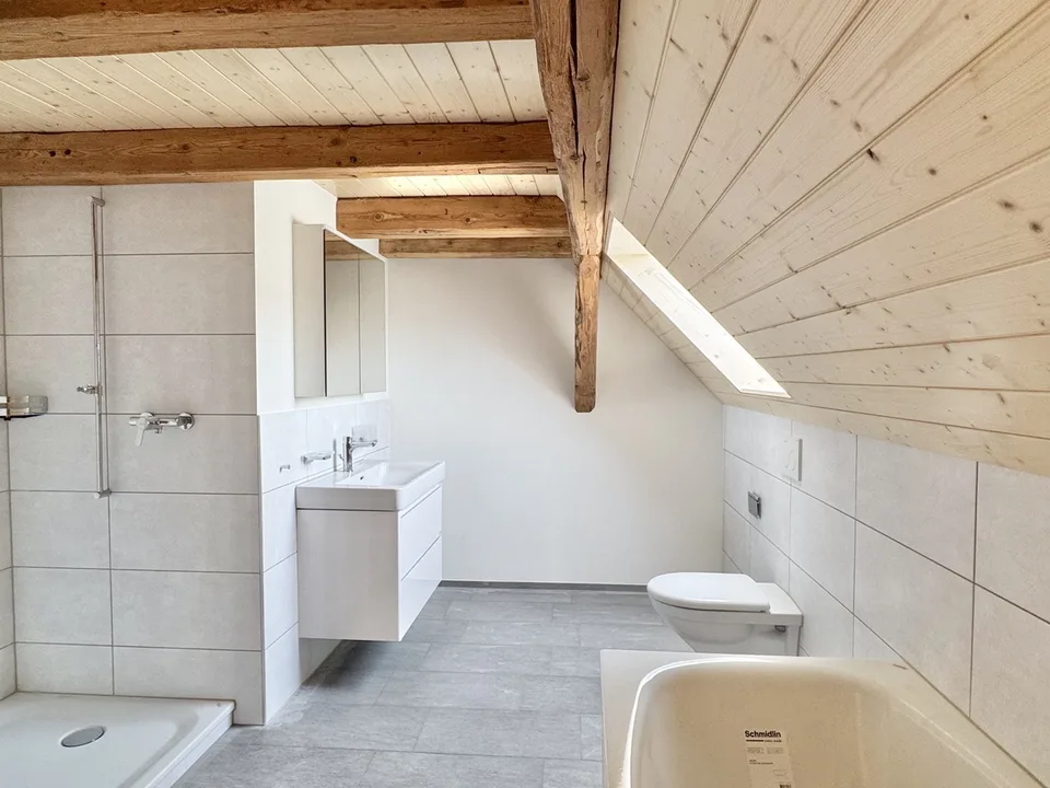 Appartamento maisonnette 4.5 locali con balcone/posto a sedere - prima occupazione