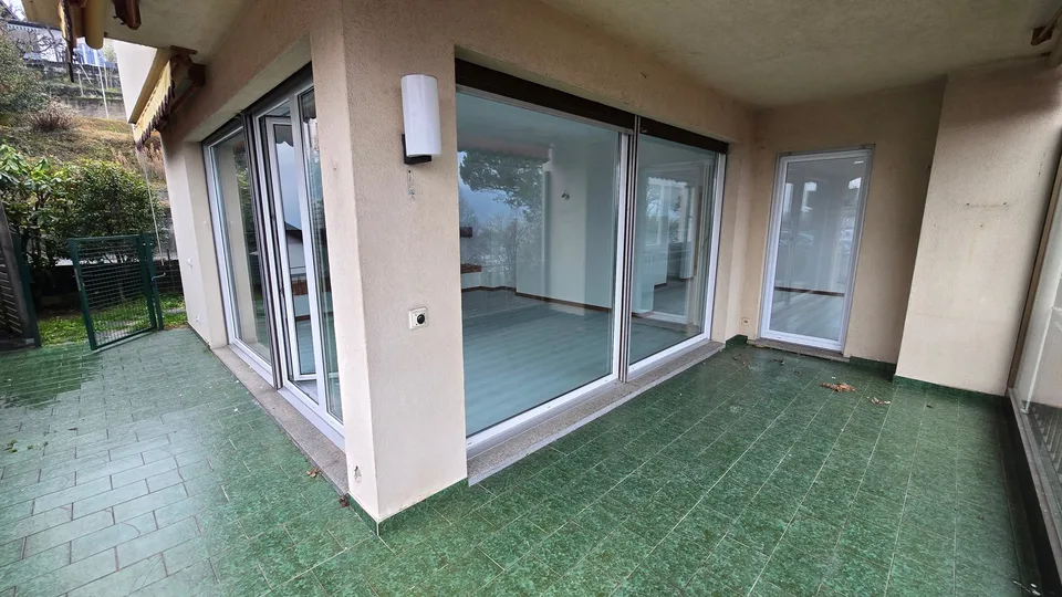 COMANO - Spacious apartment surrounded by greenery