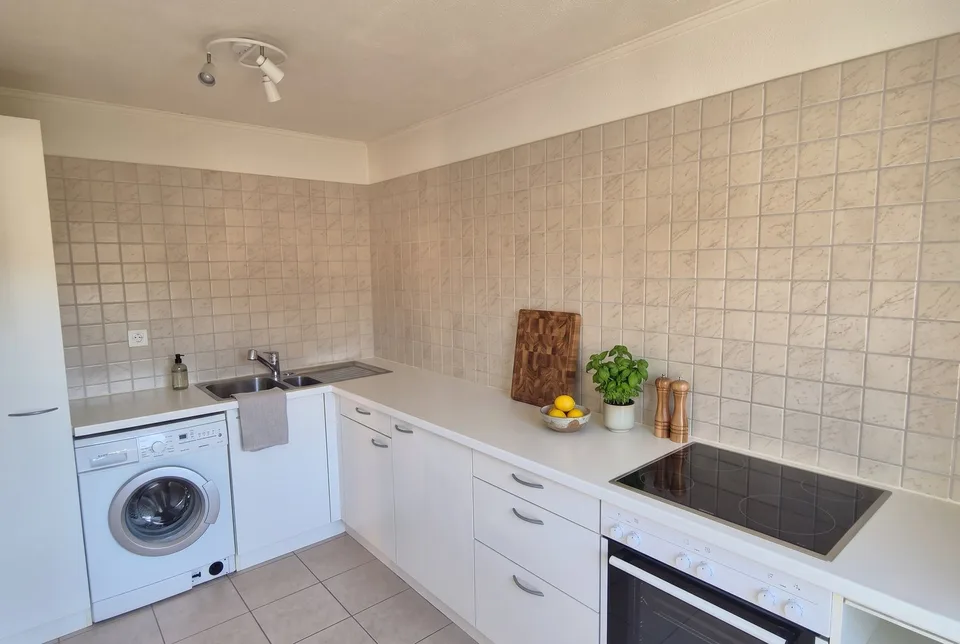 Charmanter 2,5-Zimmer-Wohnung mit Balkon – letztes Stockwerk am Ufer der Areuse