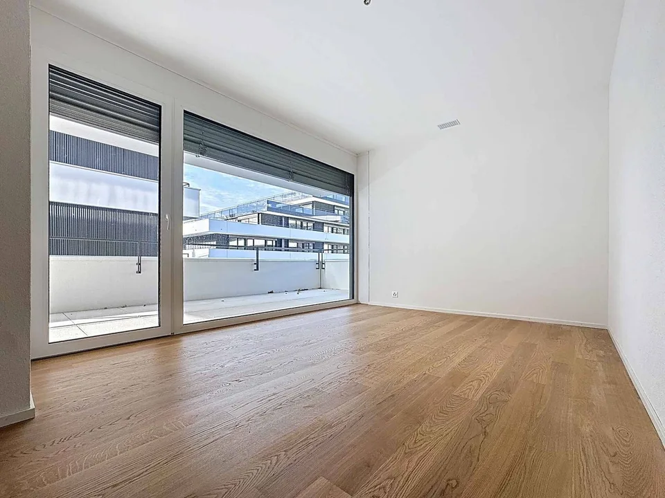 Luxueux 4.5 pièces traversant avec balcon de 76m2 et vue panoramique sur le lac