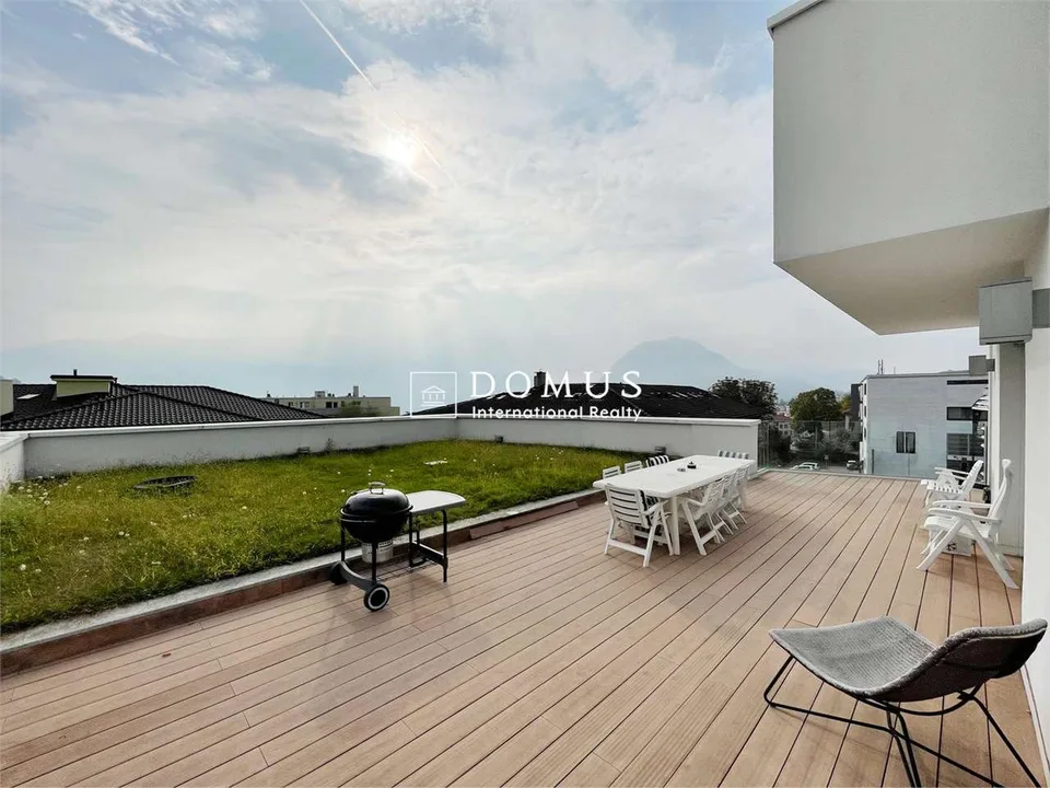 Moderno 4.5 locali, attico, con giardino