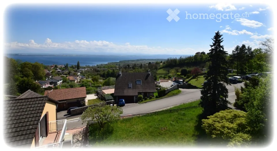 Charmante villa à Corcelles NE avec vue sur le lac et les Alpes