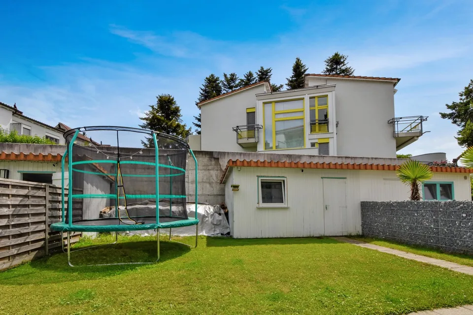 Appartement-maisonnette attractif de 5,5 pièces avec jardin, salle de loisirs et 3 places de parking souterraines – photo 22 sur 28
