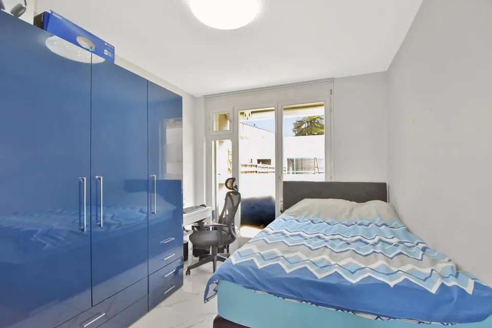 Appartement-maisonnette attractif de 5,5 pièces avec jardin, salle de loisirs et 3 places de parking souterraines – photo 15 sur 28