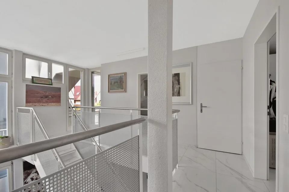 Appartement-maisonnette attractif de 5,5 pièces avec jardin, salle de loisirs et 3 places de parking souterraines – photo 20 sur 28