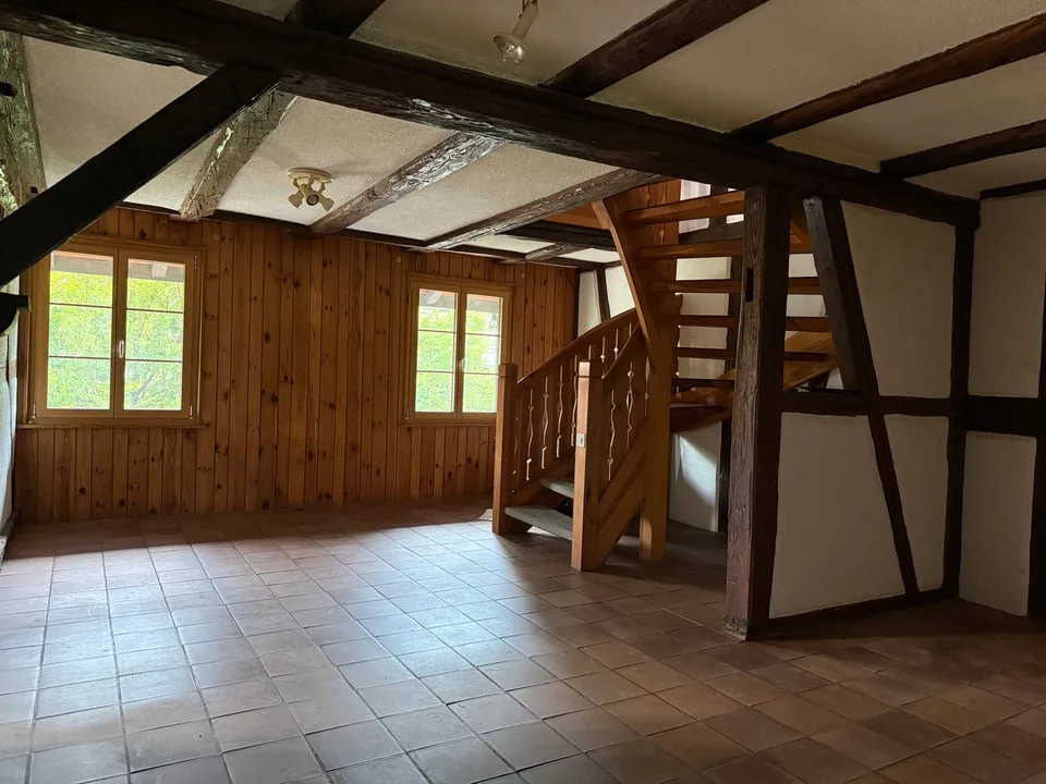 Casa a schiera caratteristica con grande potenziale