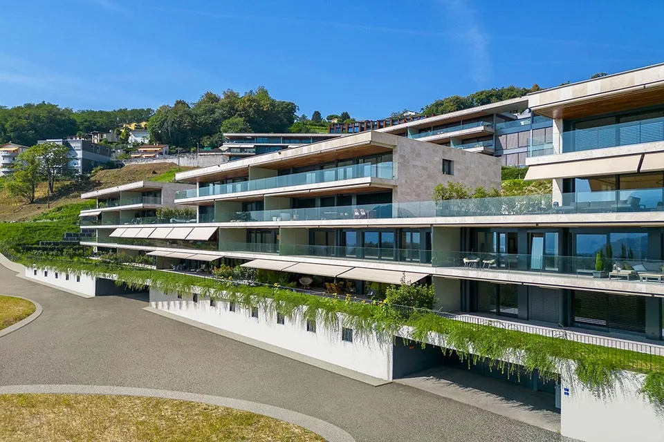 Appartement moderne avec grande terrasse et vue sur le lac
