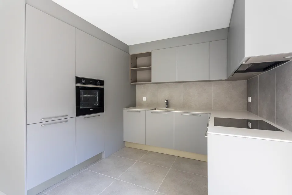 Appartamento di 4,5 locali al piano terra con parcheggio sotterraneo   LOT 1