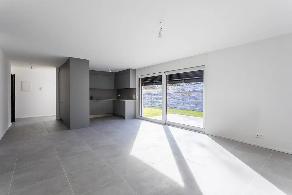 Appartamento di 4,5 locali al piano terra con parcheggio sotterraneo   LOT 1
