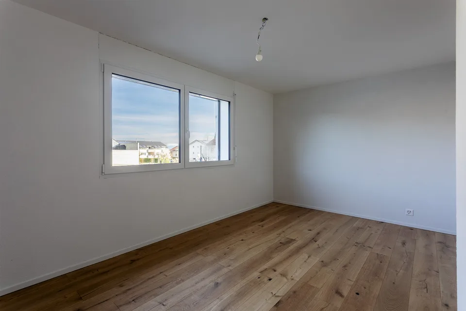 Appartamento di 4,5 locali al piano terra con parcheggio sotterraneo   LOT 1