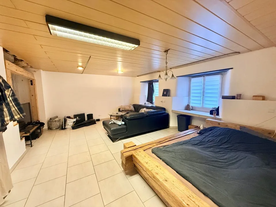 Espace mixte avec appartement 2,5 pièces et atelier - Centre de Tramelan