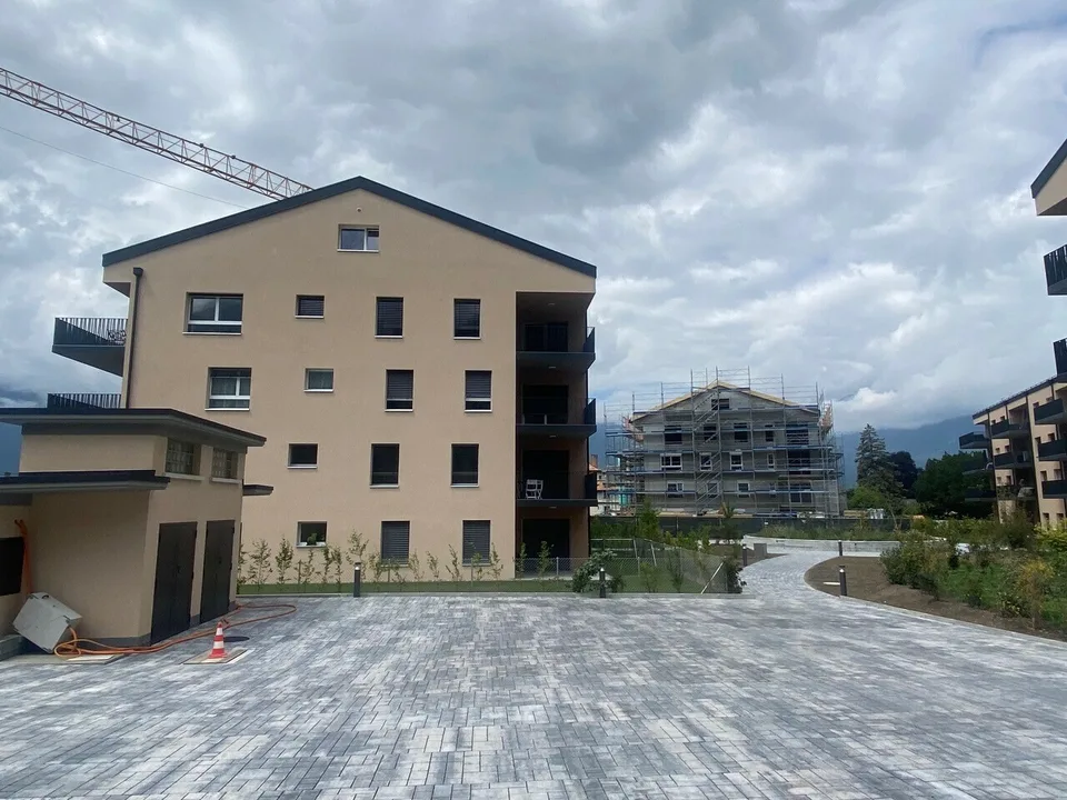 Parkplatz in Innenhof zu vermieten in Aigle