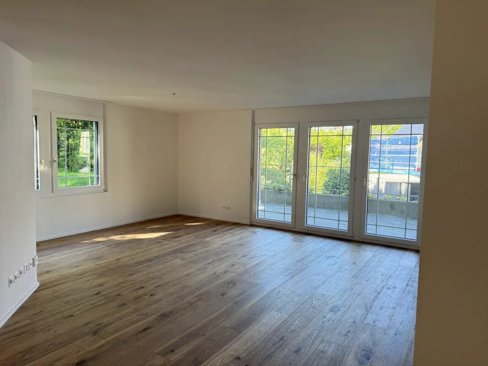 Attraktive 5.5-Zimmerwohnung mit eigenem Garten!