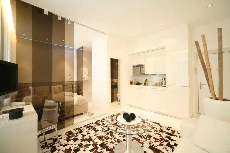 Un chambre junior, kitchenette - Appartement meublé avec ménage hebdomadaire inclus