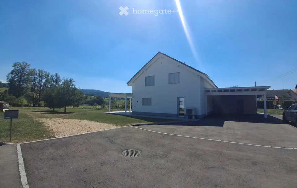 Casa nuova di 5.5 locali a Charmoille – Comfort moderno e ambiente verde