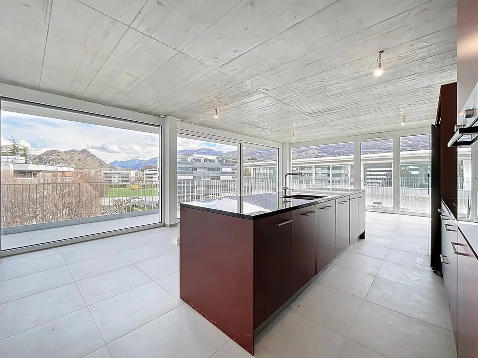 Bright attic with large balcony
