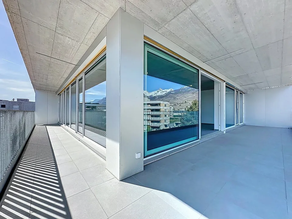 Bright attic with large balcony