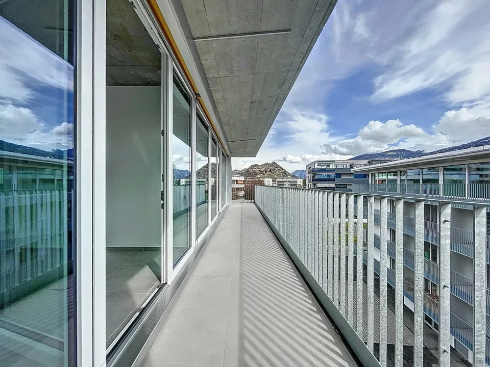 Bright attic with large balcony