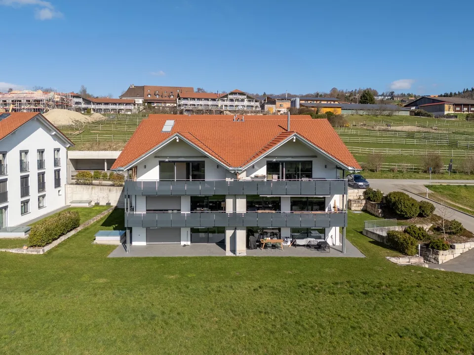 Attique 5.5 pièces avec grande terrasse et dégagement – 198 m² habitables