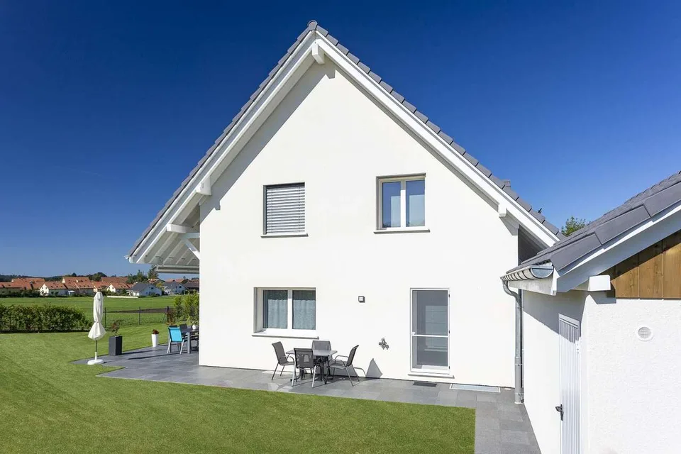 Villa jumelle par garages de 5.5 pièces à Oron-la-Ville