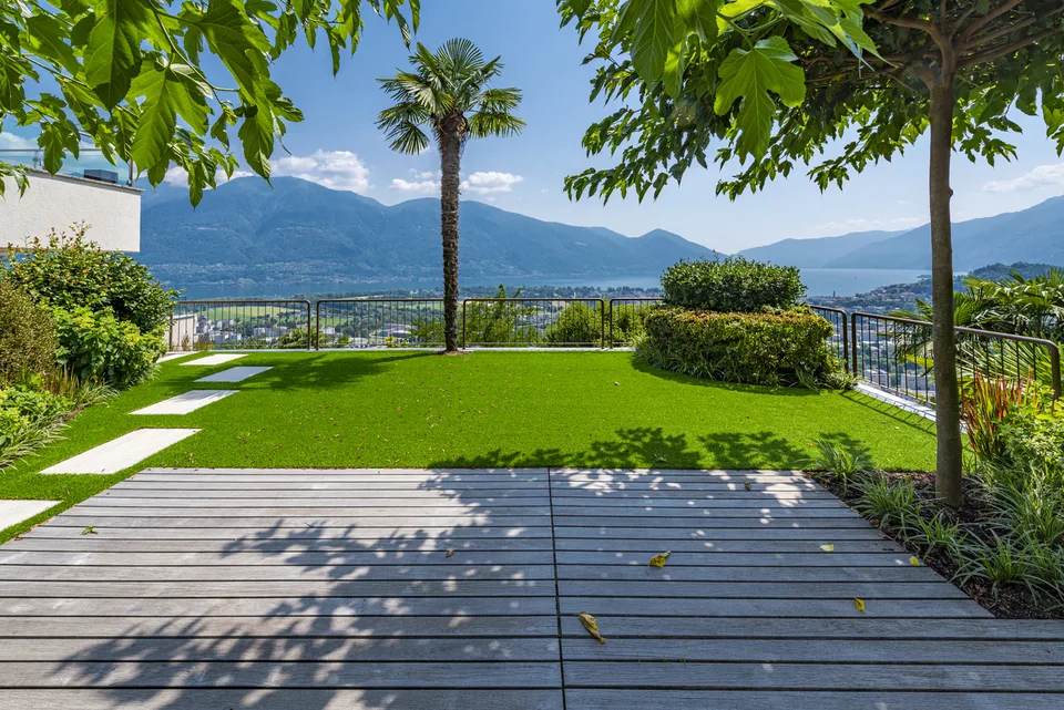 Appartamento 4,5 locali con ampia terrazza, giardino e vista lago – Foto 24 von 36
