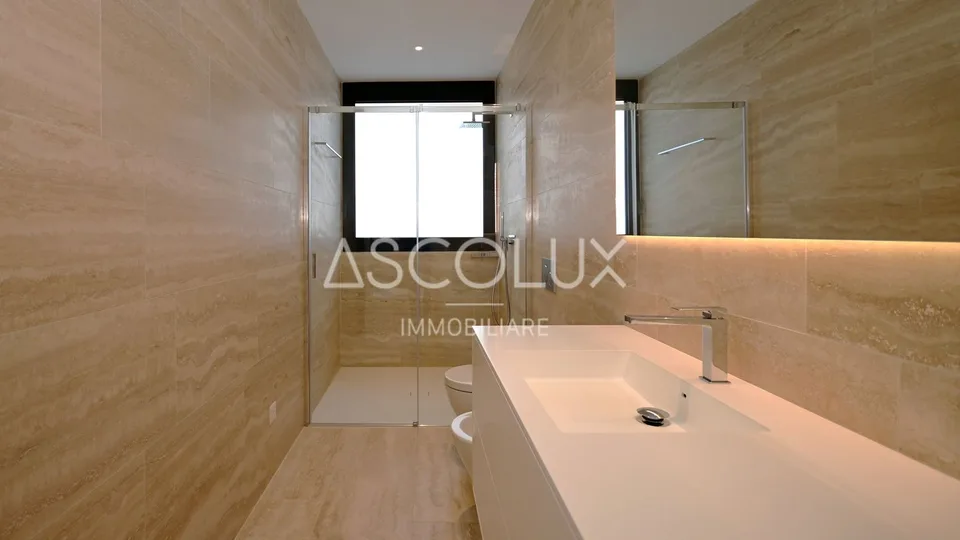 Appartement moderne de 2,5 pièces dans une résidence avec piscine extérieure chauffée et sauna – photo 14 sur 20