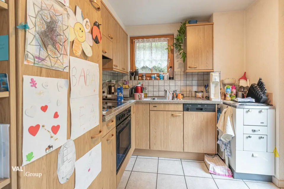 Maison multifamiliale spacieuse dans un environnement verdoyant