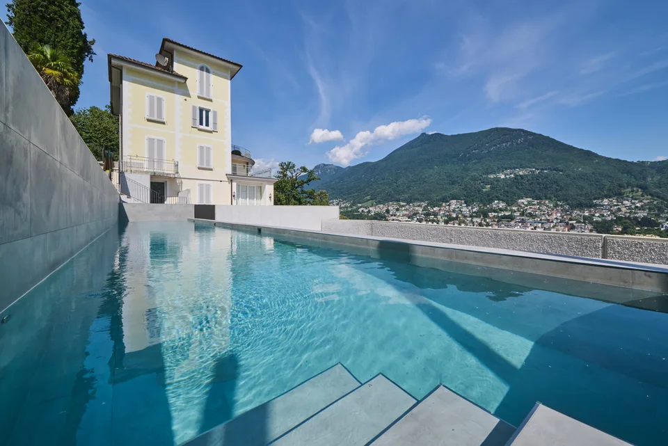 Moderno Appartamento con Ampia Terrazza e Giardino
