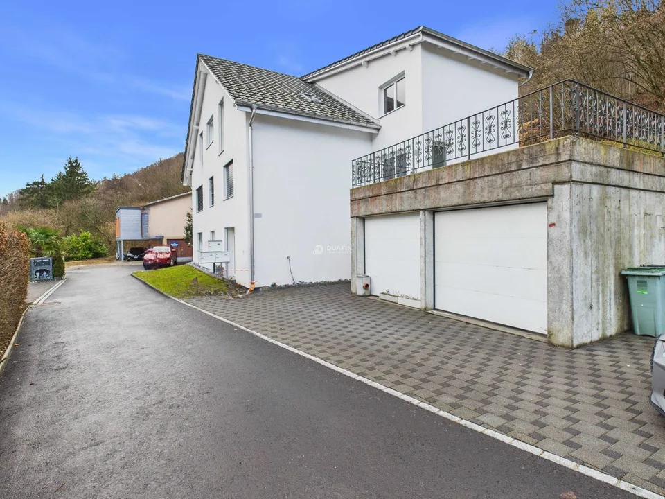 3-Familienhaus, saniert 2021, mit 2 Garagen in Trimbach