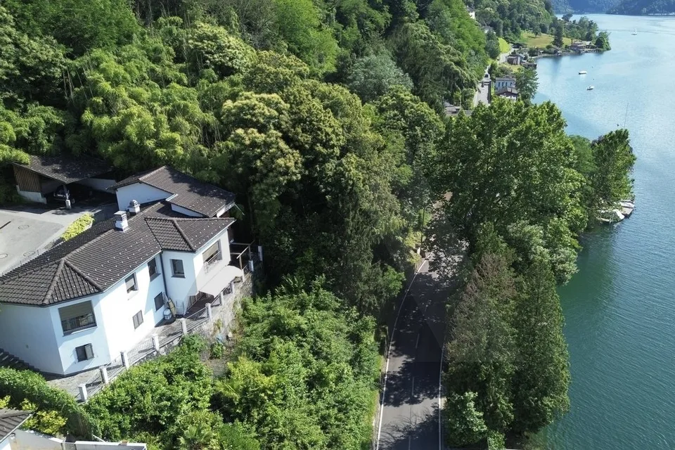 PROPRIETÀ CON MERAVIGLIOSA VISTA LAGO A LUGANO