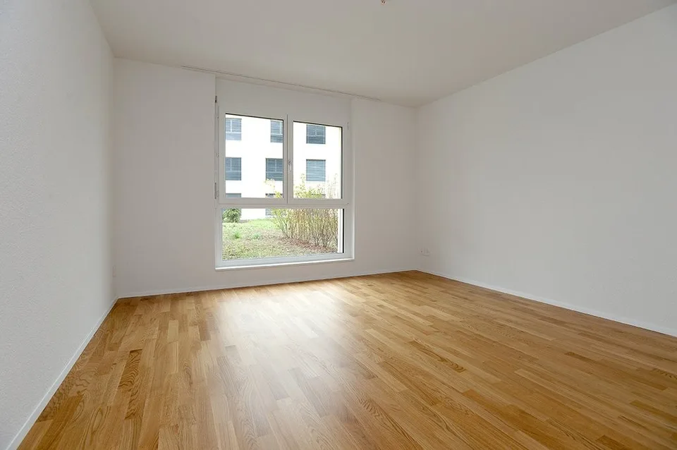 Modern 2.5-room apartment with garden seating area