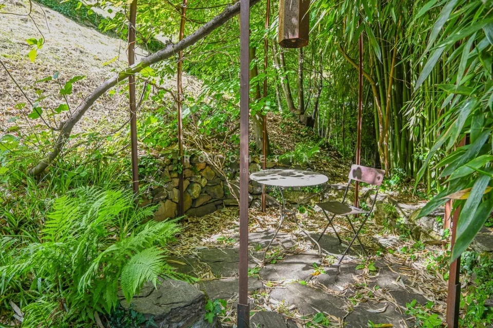 Capolavoro architettonico con fascino ticinese e vista lago – photo 12 of 13