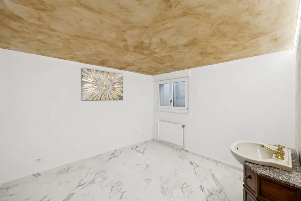 Familienvilla mit Potenzial für die Schaffung einer zweiten Wohnung – Foto 12 von 25