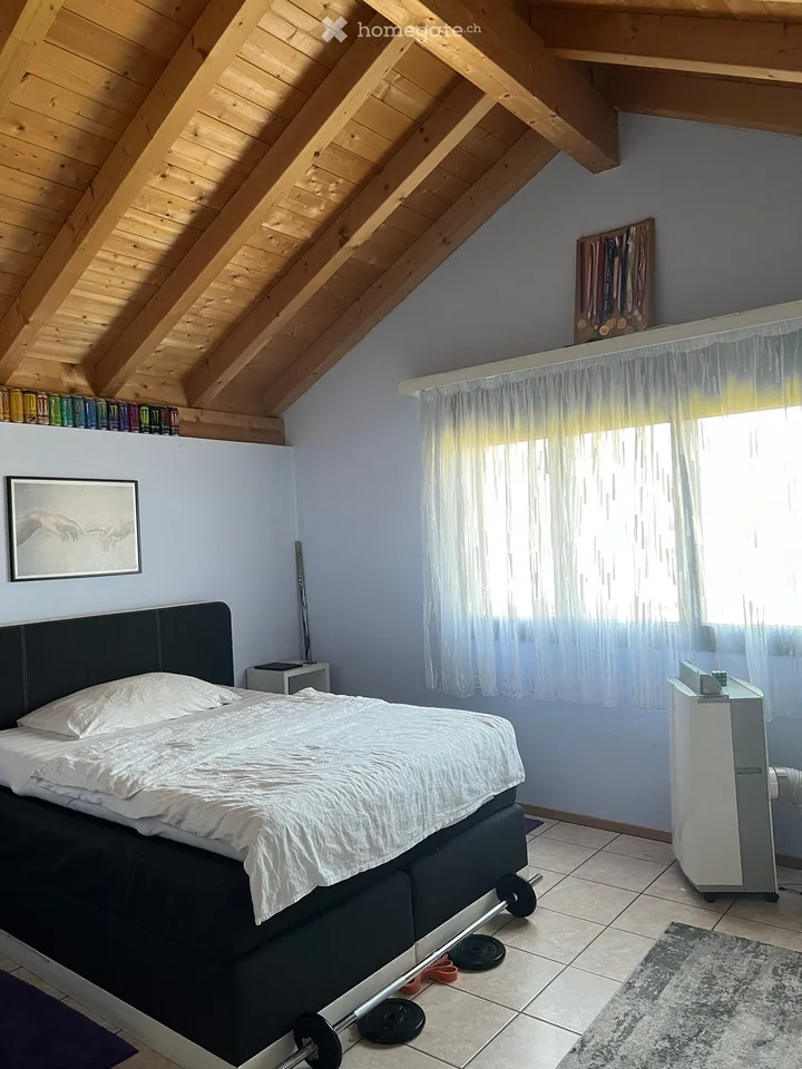 Maison unifamiliale avec jardin et 2 places de parking
